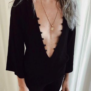 Flynn Skye black raw edged deep plunge blouse
